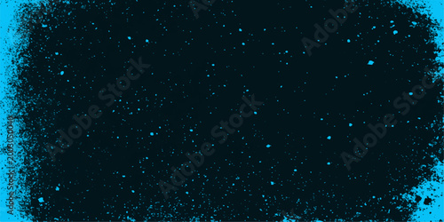 Rain drops on the window shimmer like blue starlight against the dark night sky as water particles drift through the black winter universe of a motion blurred galaxy