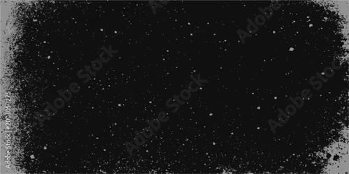 Abstract rain drops on a window and black background create a cosmic motion of snow and starlight across the dark nature of a galaxy universe