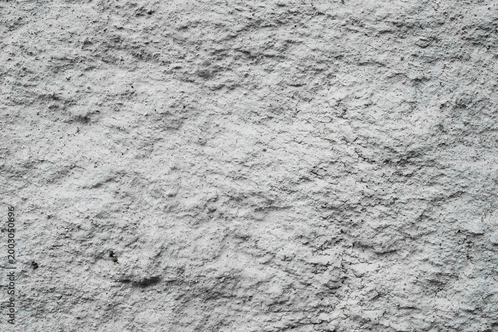 Fototapeta premium Gray concrete wall texture, rough cement surface background with stains and imperfections.