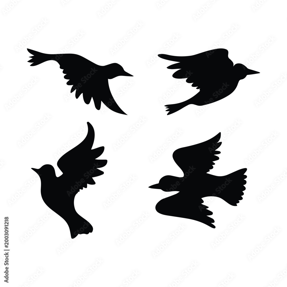 Fototapeta premium Flying bird silhouettes in various poses for nature design elements