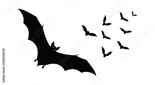 Halloween night flight a silhouette of bats soaring against a white background