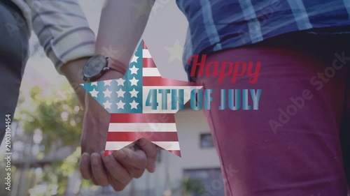 Couple approaching, joining hands in yard, watch visible as July 4 star fading over hands marketing