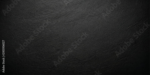 A close-up view showcasing the exquisite texture of premium black leather, highlighting its luxuriousness, and subtle natural details. 