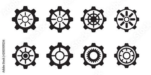 Black gear icons with different internal designs representing mechanics engineering and industrial settings as symbols of work.