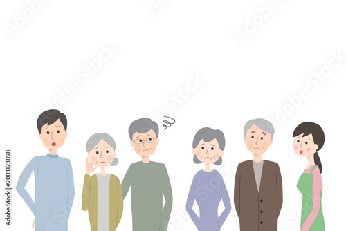 不安そうに見上げているシニアと介護スタッフ