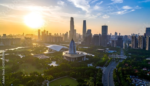 Skyline view during golden hour, featuring trees and urban architecture under a sunny sky, creating a vibrant urban scene
