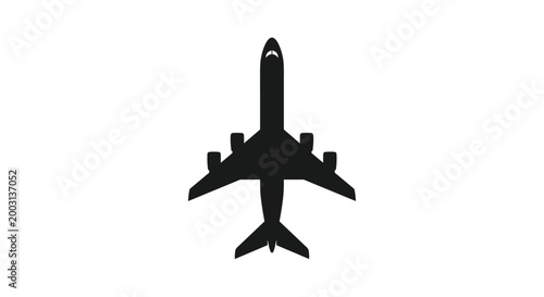 Symmetrical black silhouette of a large four-engine passenger airplane seen from a direct top-down view for travel concepts.