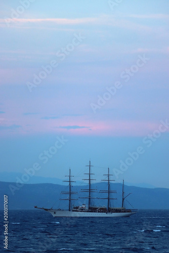 Retro sailing ship during blue hour. Vacation in Croatia.