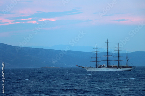 Retro sailing ship during blue hour. Vacation in Croatia.