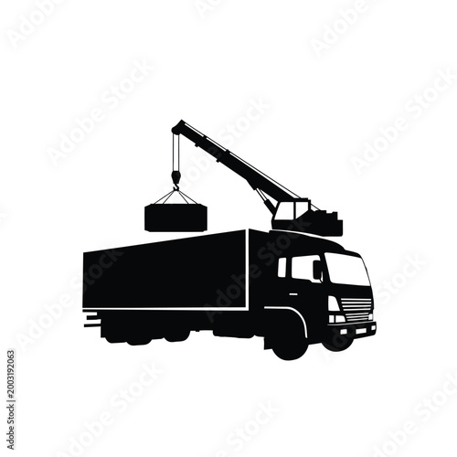 Black silhouette of a heavy duty truck with a mounted crane lifting a cargo container