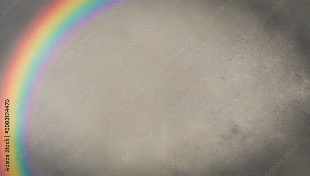 Obraz premium Rainbow's Grace: A vibrant rainbow arcs gracefully across a moody sky, offering a stunning contrast of color against the gray clouds. A scene that embodies hope and beauty.