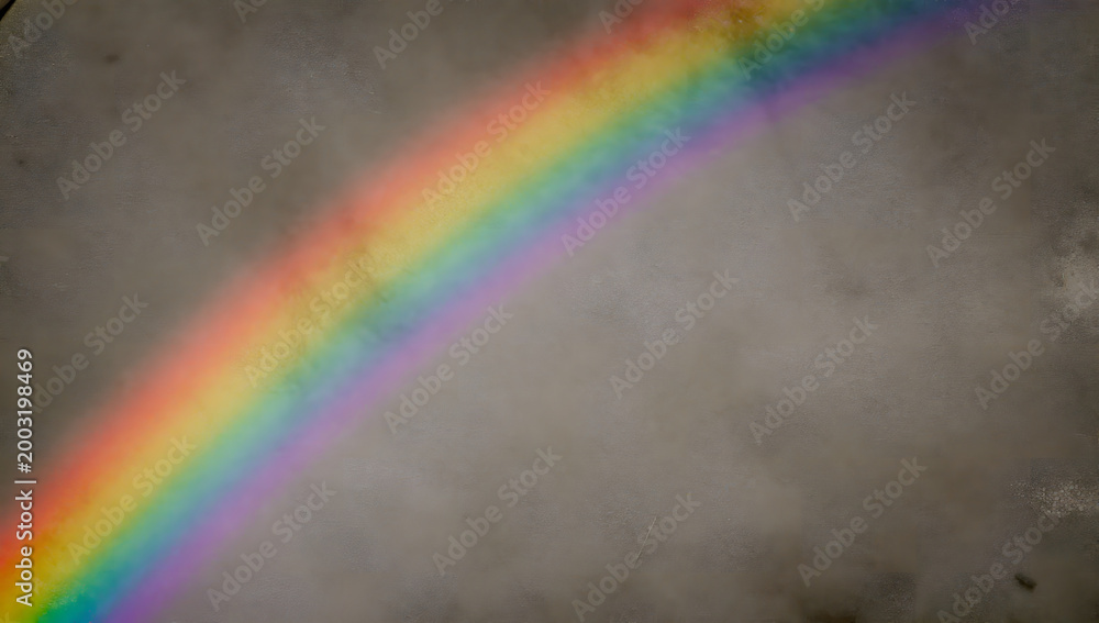 Fototapeta premium Colorful Rainbow Above the Clouds: A vibrant arc of colors gracefully cuts through a dark, moody sky, painting a scene of hope and beauty.