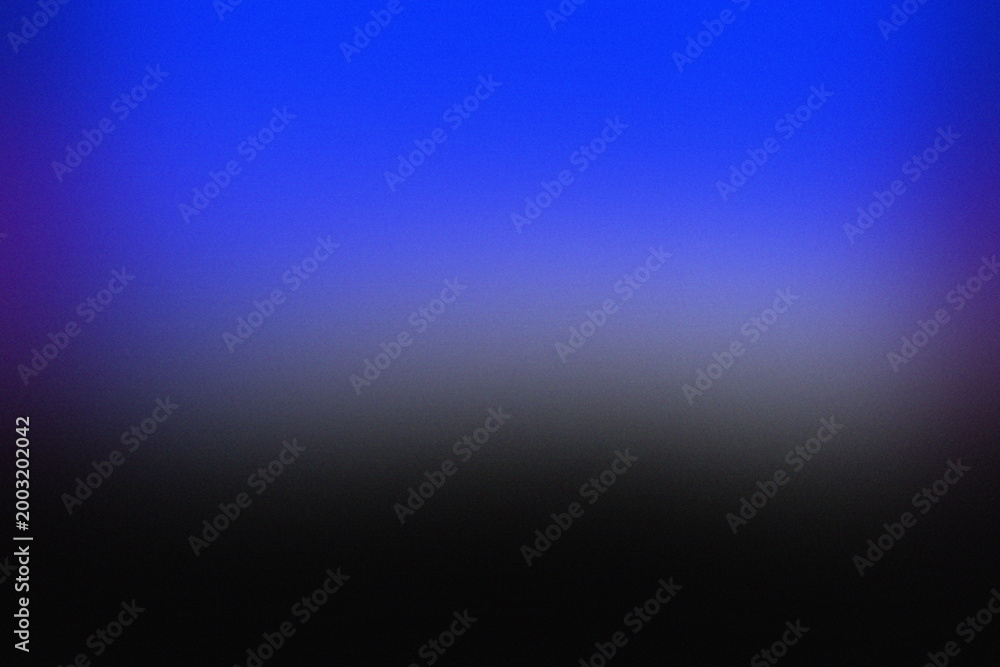 Obraz premium Deep blue and black grainy gradient background with soft light transition
