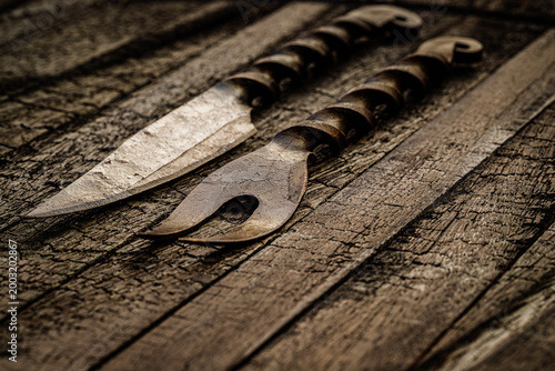 Photography Old tools for crafting wood laying on a wooden surface in a workshop