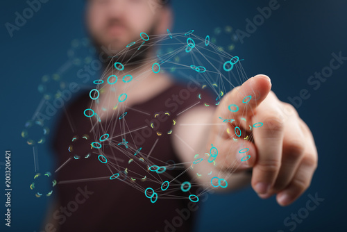 Man touching a digital sphe...