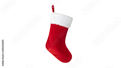 Red christmas stocking with white fluffy cuff for festive as isolated PNG