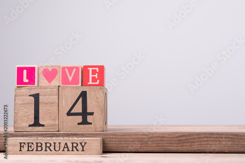 Wooden blocks spell out Lov...