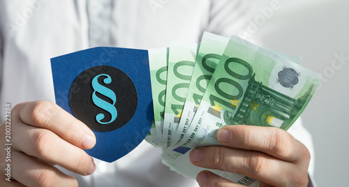 Person holding euros and le...