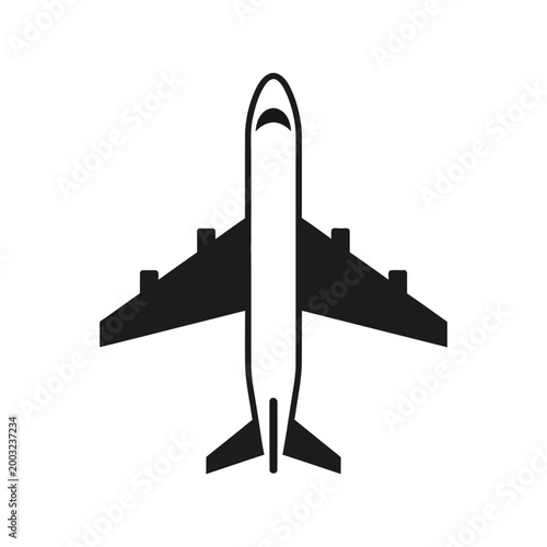 Black silhouette of a commercial airplane with four engines, viewed from directly above, isolated on a white background.