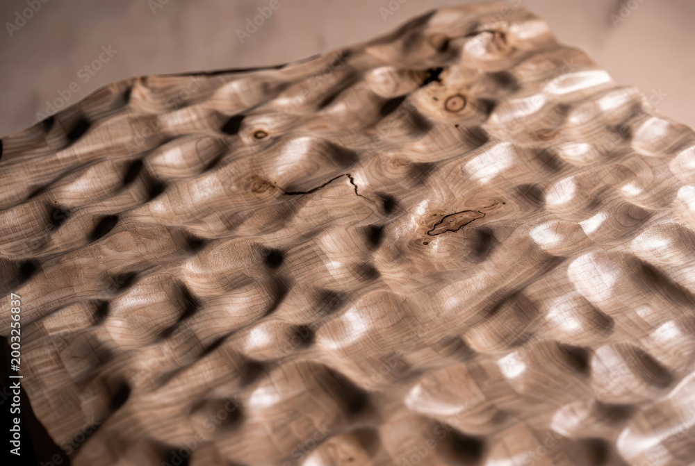 Naklejka premium Abstract organic wooden surface with natural texture, knots, and flowing curves