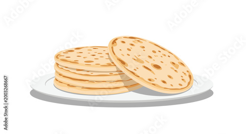 Stack of freshly prepared thin crepes or pancakes served on a simple white plate ready for a delicious and healthy breakfast meal.