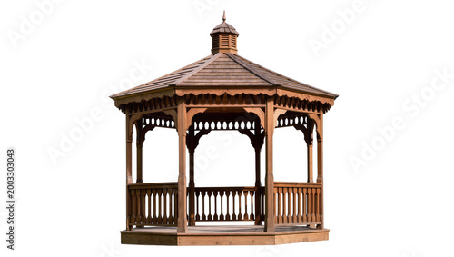 Cuadro en lienzo Isolated wooden garden gazebo with decorative roof and elegant wooden balustrade