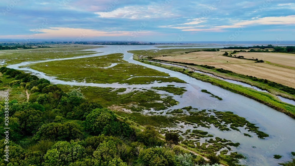 Fototapeta premium Aerial drone view of Pagham Harbour RSPB nature reserve near Sidlesham, West Sussex