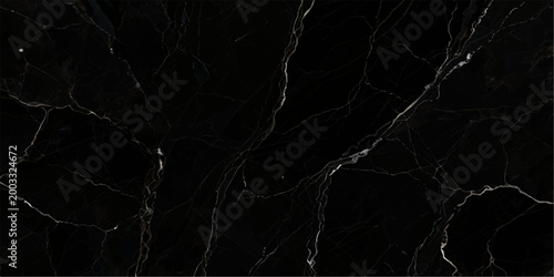 Black marble background with intricate metallic silver cracks and fine white veins, premium decorative stone texture for stylish and minimalist design concepts