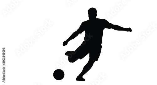 Soccer player silhouette kicking ball against white background