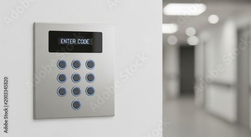 Modern stainless steel keypad with illuminated buttons and 