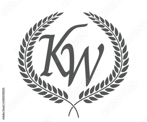 Initial letter K and W, KW monogram logo design with laurel wreath. Luxury calligraphy font.