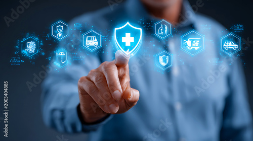 Person touching a digital shield with medical cross and various industry icons