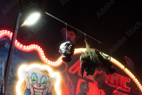Haunted house at night in amusement park Prague Czech Republic Europe glowing horror attraction background
