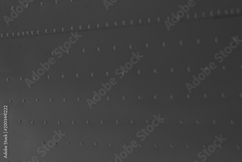 Quadro su tela Dark metallic surface with evenly spaced rivets