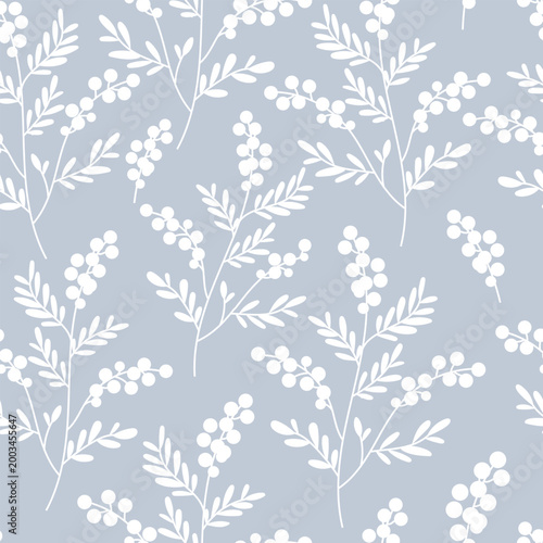 Elegant seamless botanical pattern featuring minimalist white mimosa branches and berry silhouettes on a soft light blue background for textile wallpaper fabric and surface design projects