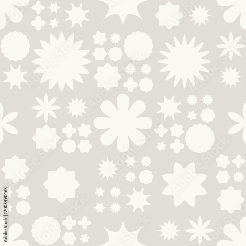 Abstract flower and star shapes forming a seamless pattern, providing a clean and minimalist decorative background with a subtle cream and gray color palette