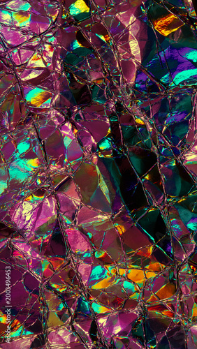 Iridescent holographic foil texture with crumpled metallic rainbow reflections for abstract backgrounds