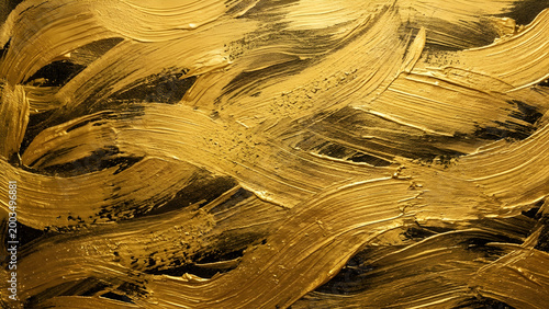 Luxury Abstract Gold Paint Brush Strokes on Dark Textured Canvas.