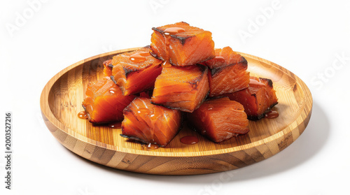 Salmon Candy on Bamboo Plate 30 Degree Angle Isolated on White Background Studio Image