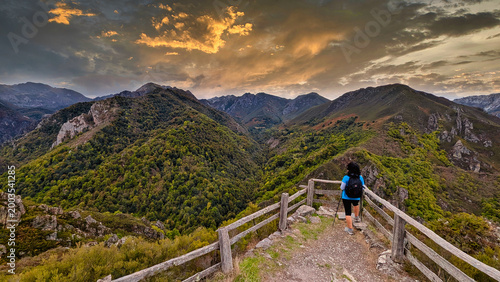 Woman at the viewpoint of El Pozo La Oración, on the road from Bezanes to Brañagallones, Redes Natural Park and Biosphere reserve, Asturias, Spain
