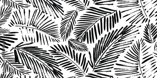 Black and white tropical palm leaves pattern with hand drawn style