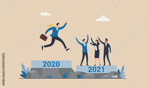 Fotografie New 2021 meeting teams together or new challenge coming concept, confident success businessman attempt to jump high overcome risk to next cliff