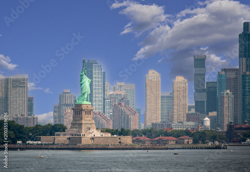 New york, usa august 16,2024. Statue of liberty overlooking manhattan skyline and hudson river, iconic symbol of freedom and american history welcoming visitors