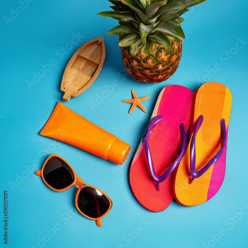 Enjoy Summer Vibes With Colorful Flip Flops, Sunglasses, and a Pineapple on a...