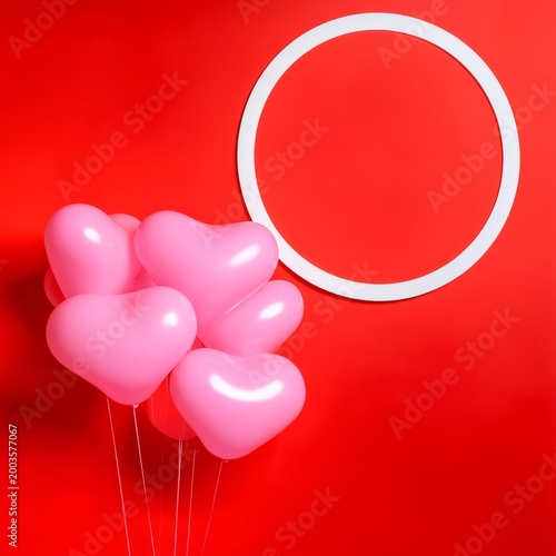 Pink Heart Balloons Beside a Round Blank Frame on a Bright Red Wall Creating ...