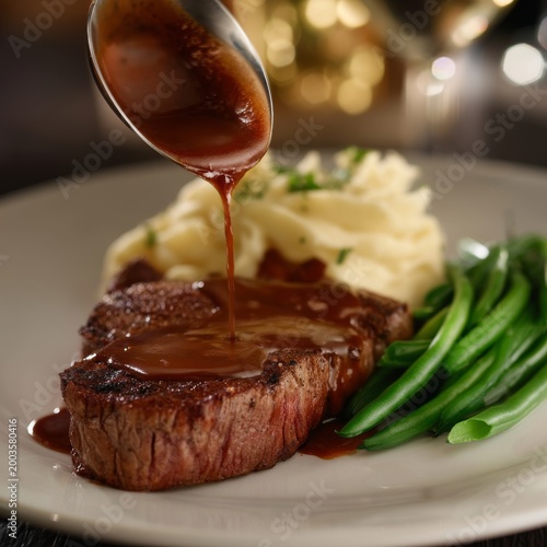 Dinner Plate With Beef, Mashed Potatoes, and Green Beans Served in a Restaura...