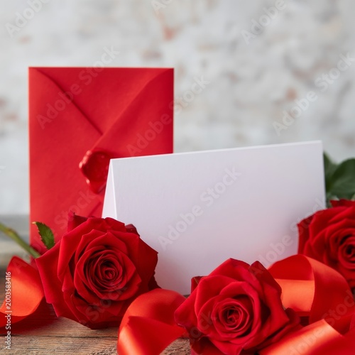 Roses and Envelopes on Red Background for Special Occasion or Message
