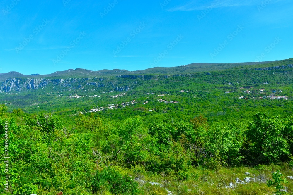Obraz premium View of mountains above Vinodol forest covered valley in Croatia