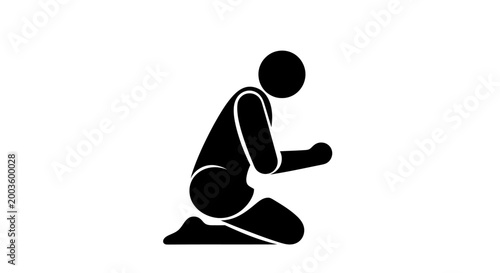 Silhouette of a person kneeling in prayer or meditation against a white background