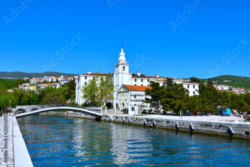 Church of the assumtion next to a bridge across river Dubračina in Crikvenica, Primorje, Croatia